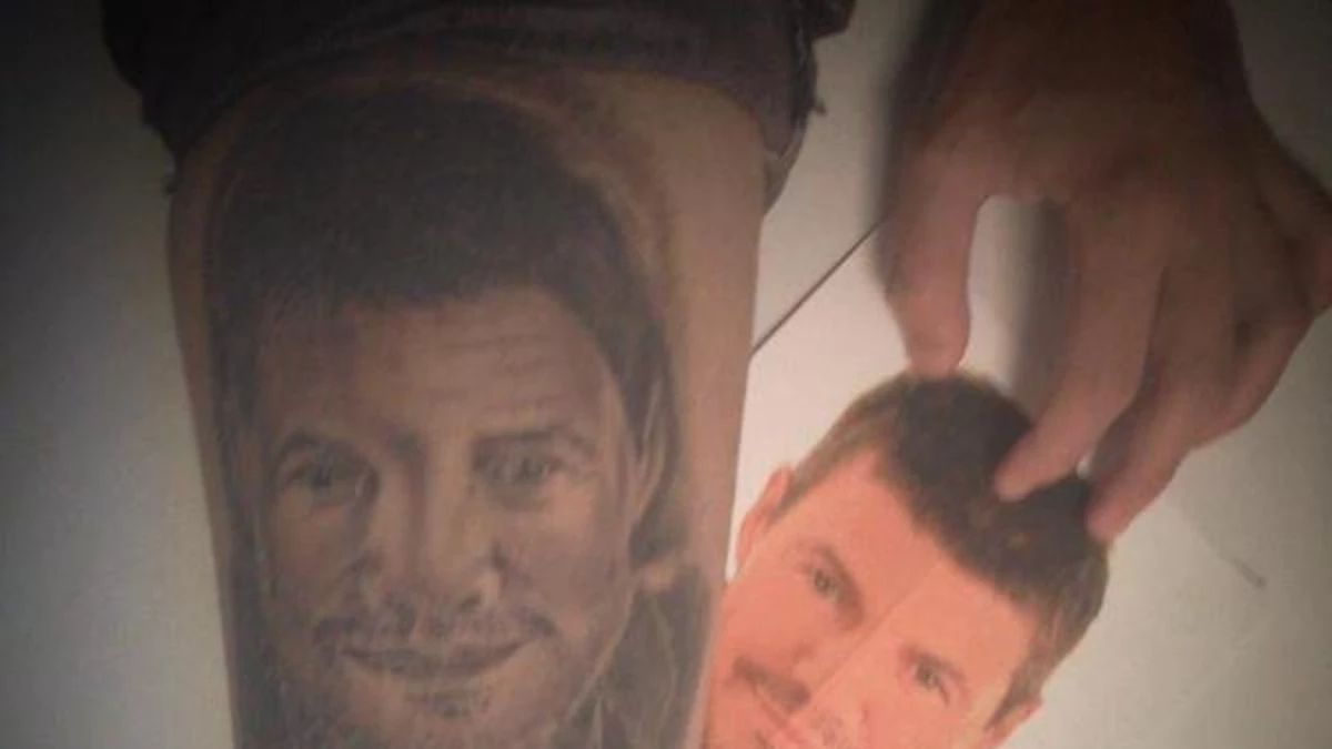 ¡No podés! Fan se tatuó la cara de Tinelli en la pierna