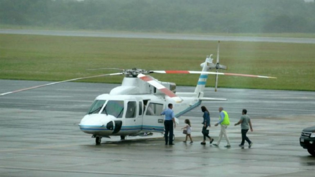 Macri uso su helicoptero para recoger la familia en Uruguay