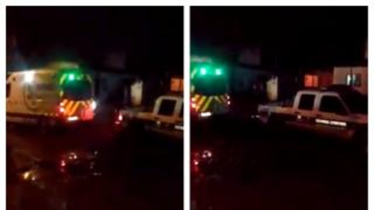 Ambulancia y patrullero, estancados en el barro