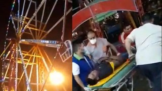 Un nene y su padre cayeron de la vuelta al mundo en un parque de diversiones